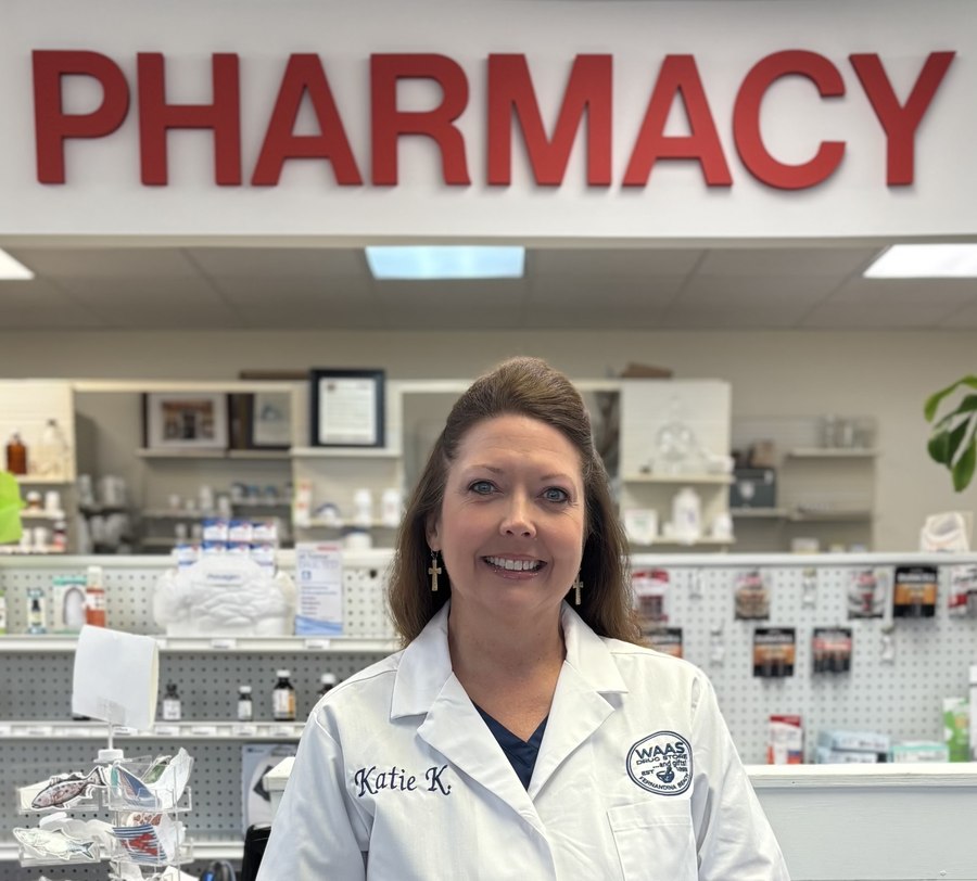 Katie Kotopka, Pharm.D., the pharmacist at Waas Drug Store, behind the pharmacy counter